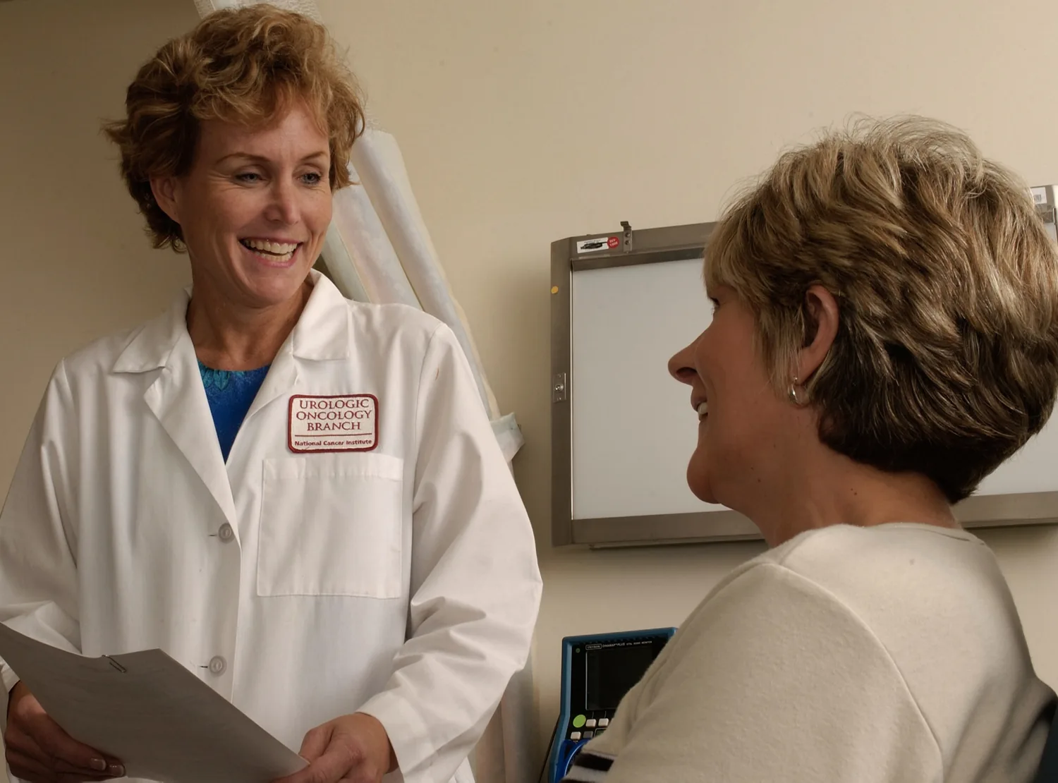 Doctor speaking with a patient, representative healthcare image